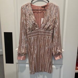 Beautiful party dress, never worn with tags